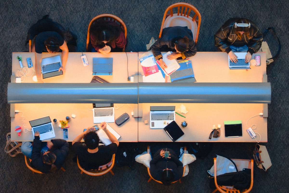 Students working together at a shared study table